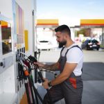 person-spending-time-gas-station